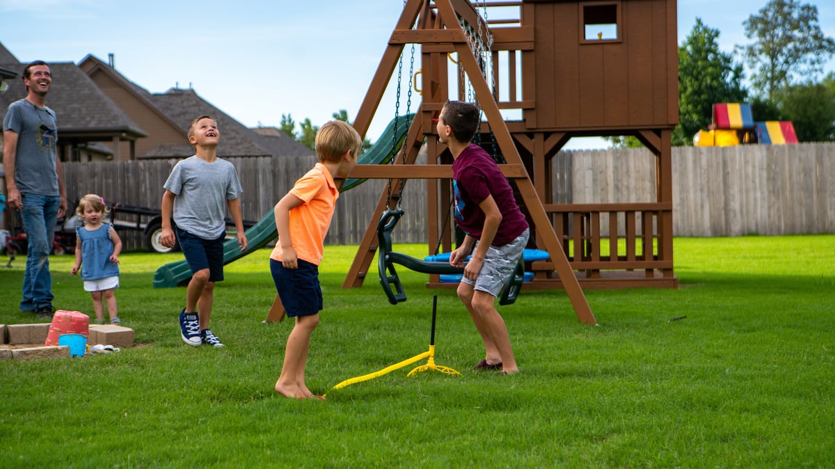 children playing on healthy lawn
