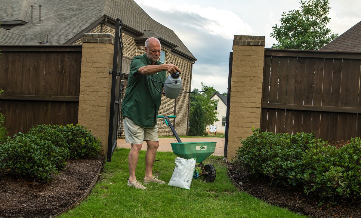 customer reads how to spray weed control