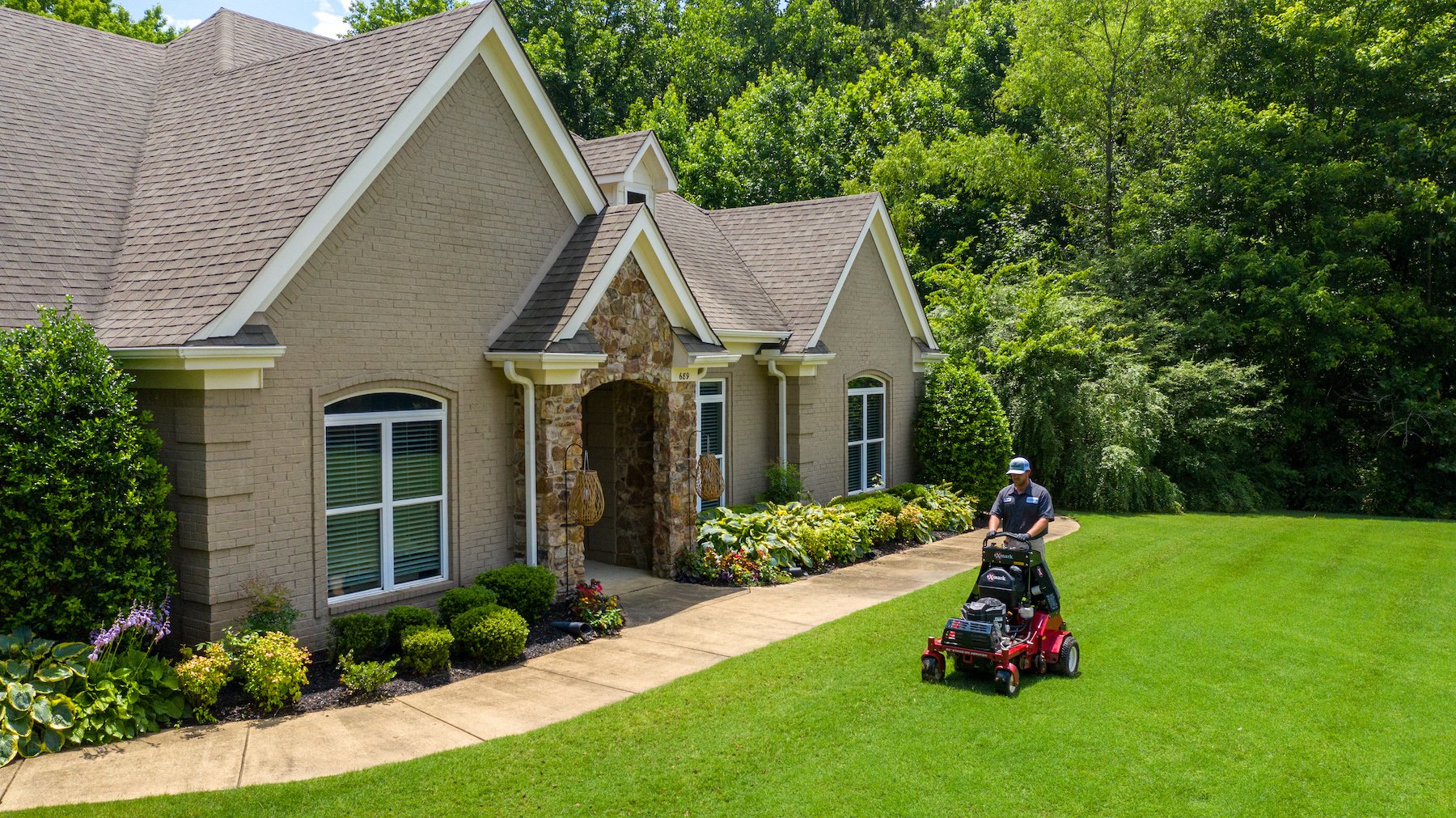 lawn care technician aerating