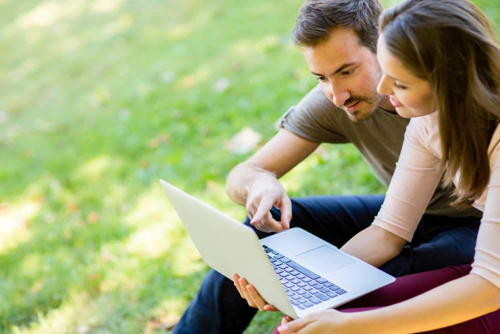 couple searching for lawn services company
