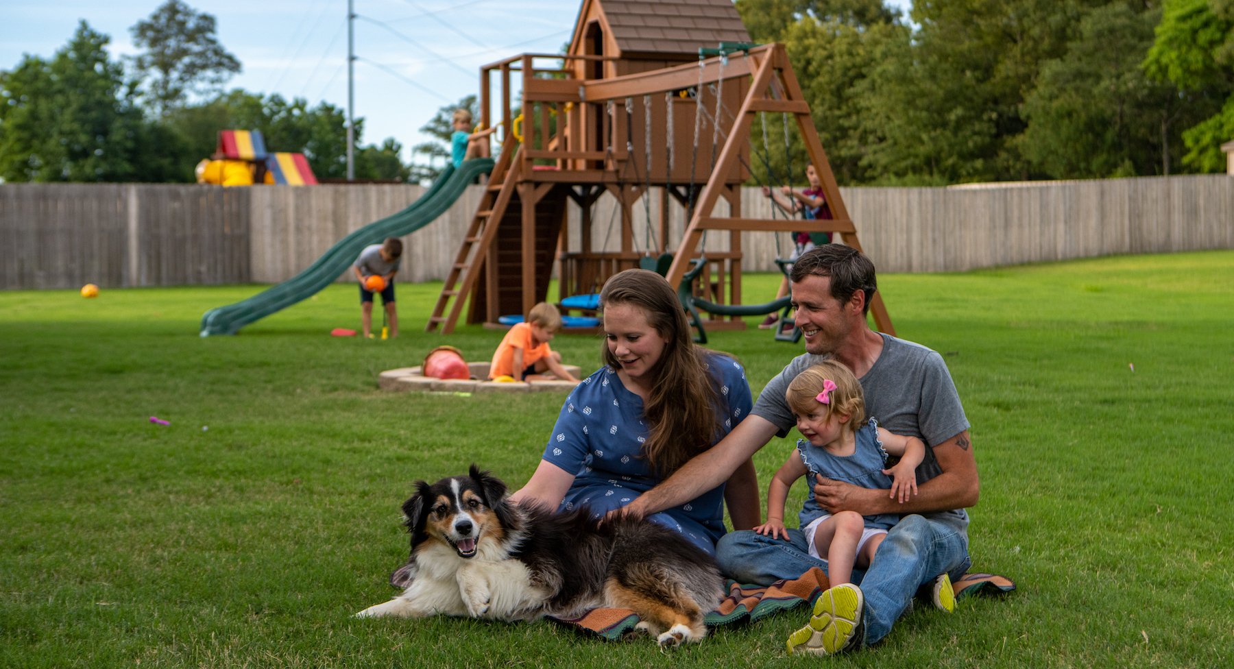 yard with family and dog